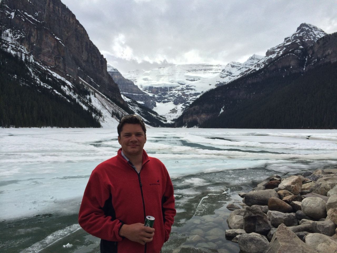 Robert Wallace beside a frozen mountain lake