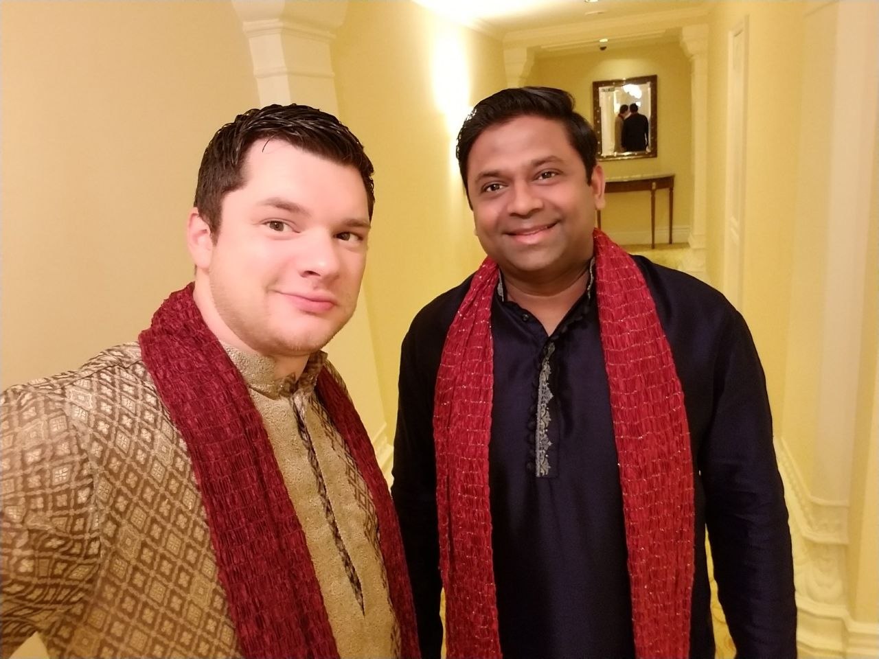 Robert Wallace and a fellow traveler indoors