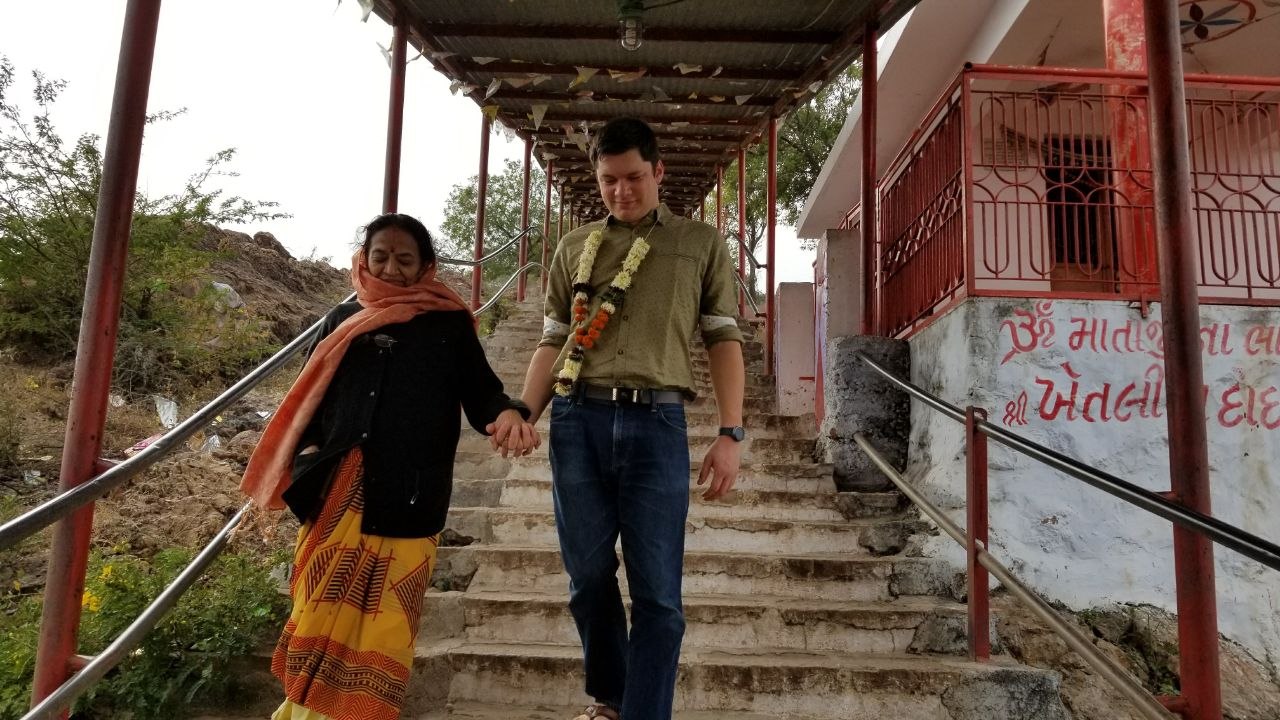 Robert Wallace and a fellow traveler on a hillside stairway